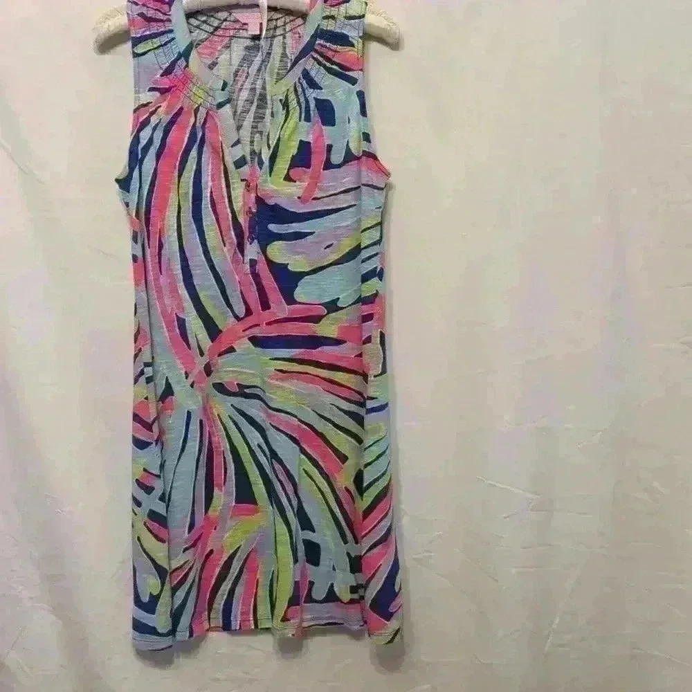 Lilly Pulitzer dress with smocking and gold tone buttons. Size S